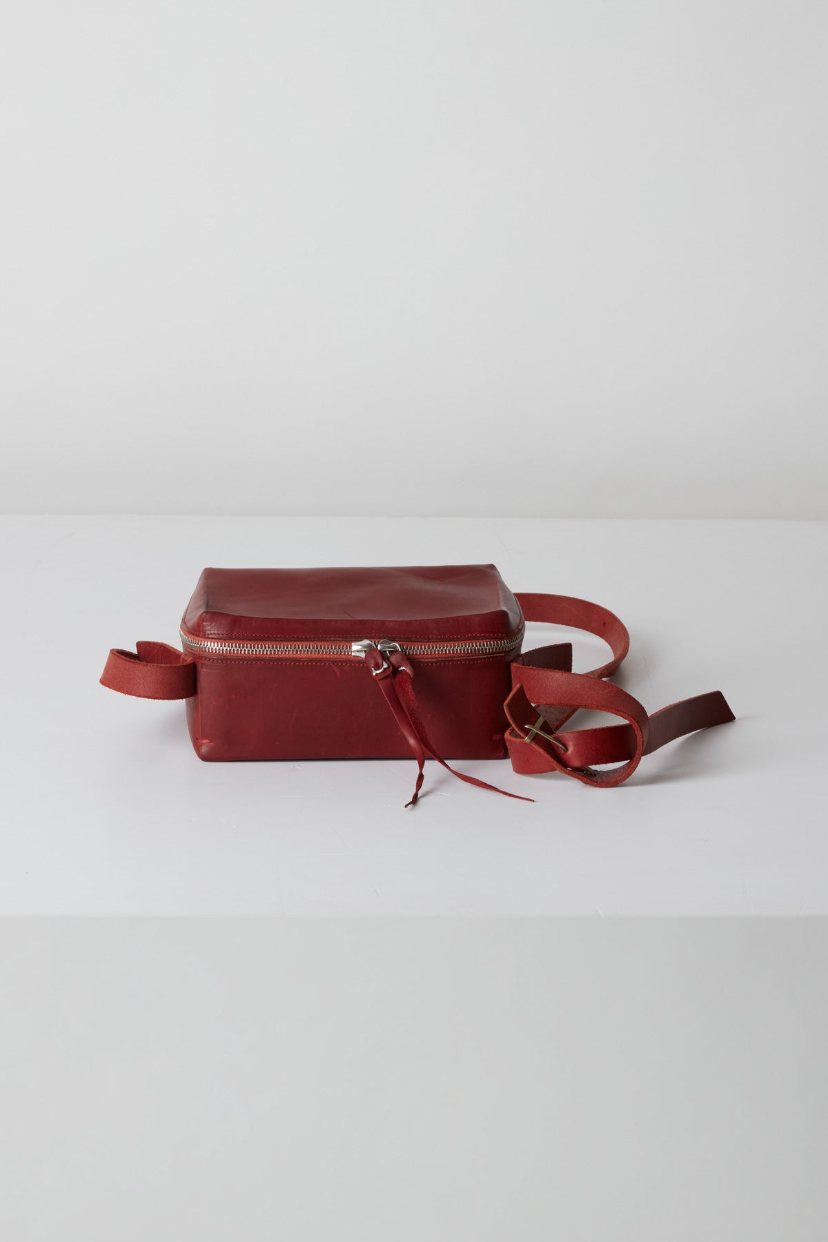 SMALL ZIPPED BRIEF CASE LONG STRAP